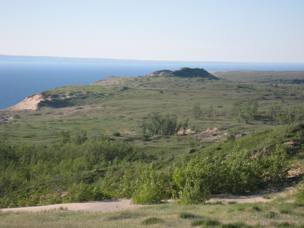 Michigan TC 2010-07 0850.jpg - I believe this is what remains of the actual "Sleeping Bear Dune". The sign says it is in the process of being "blown out", where the wind cuts through the dune eventually leveling it.